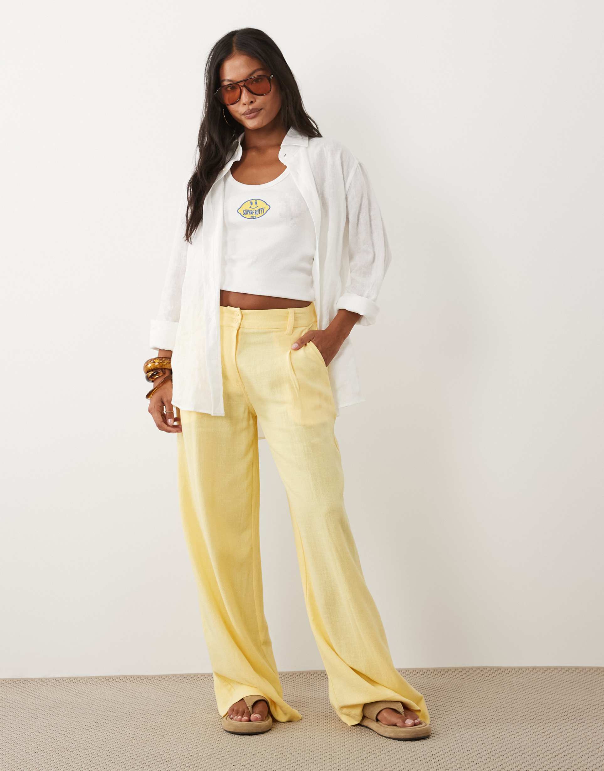 asos design petite relaxed straight leg pants with linen in yellow