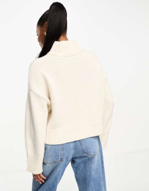 ASOS DESIGN Petite relaxed sweater with zip collar in cream