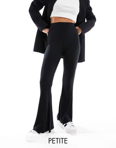 ASOS DESIGN Petite ribbed flare pants with lettuce hem in black - view 1