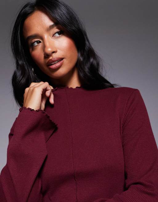 ASOS DESIGN Petite ribbed long sleeve lettuce hem mini dress in burgundy