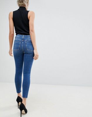 bright blue high waisted skinny jeans