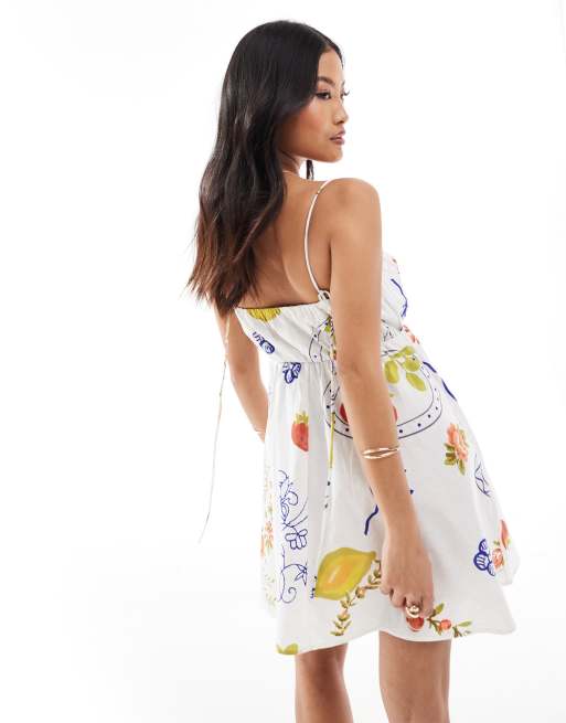 ASOS DESIGN Petite Robe d ete courte avec buste fronce et bretelles reglables imprimee sur l ensemble ASOS