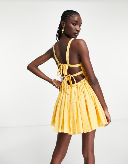 ASOS DESIGN Petite Robe patineuse d ete courte et fluide a bretelles avec rayures texturees Citron ASOS