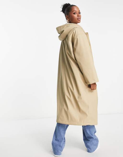 ASOS DESIGN Petite rubberised borg lined rain coat in stone