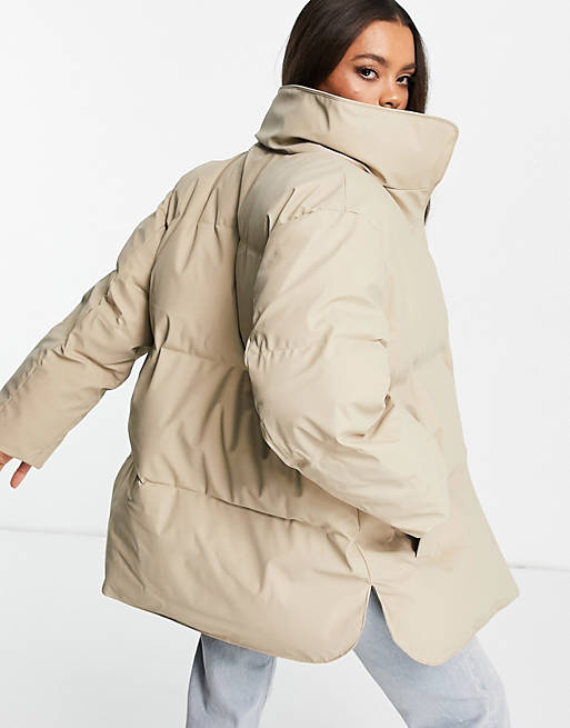 Leopard resist Applicable ASOS DESIGN Petite rubberized oversized puffer jacket in camel | ASOS
