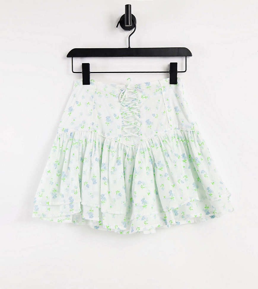 ASOS DESIGN Petite ruffle mini skirt with lace up detail in floral print-Multi