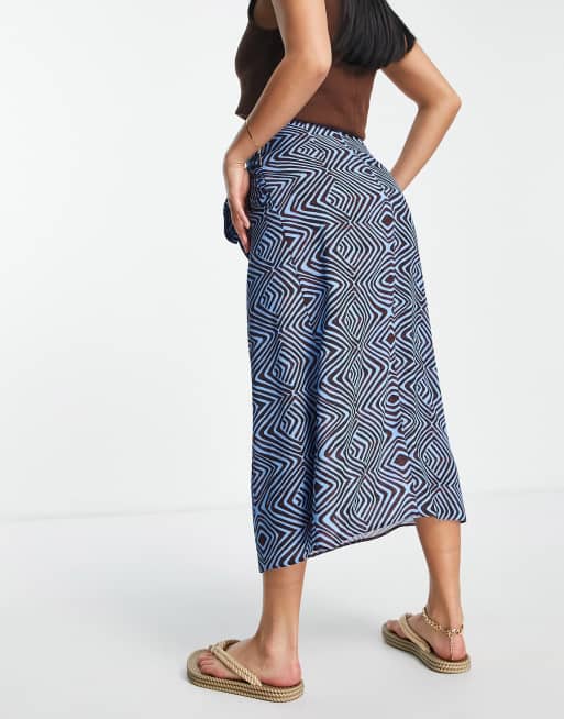 ASOS DESIGN Petite sarong wrap midi skirt in geo print
