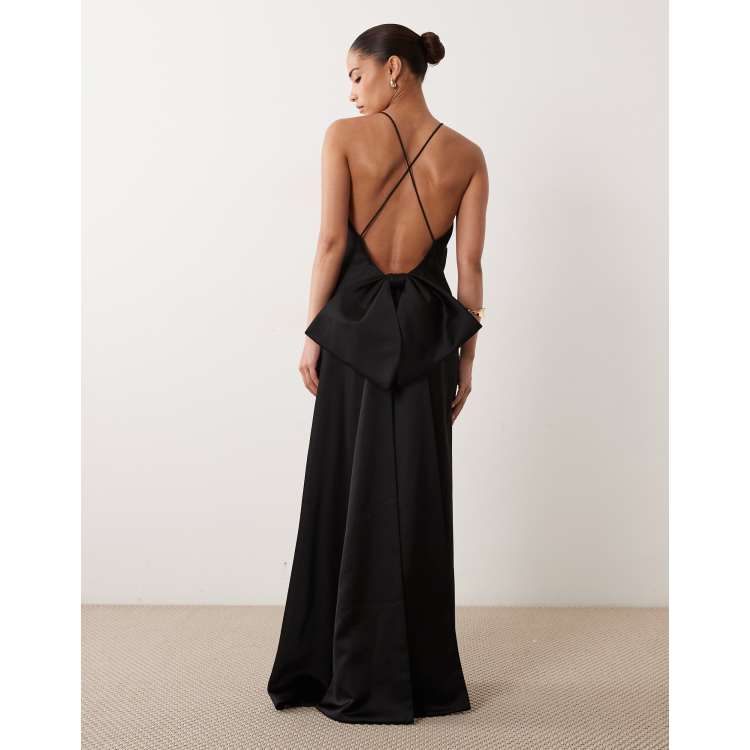 black dress with bow back Bow-Detail Pleated A-Line Mini in - 2 Pair with heels and a clutch bag for a glamourous evening look ASOS DESIGN Petite satin cami