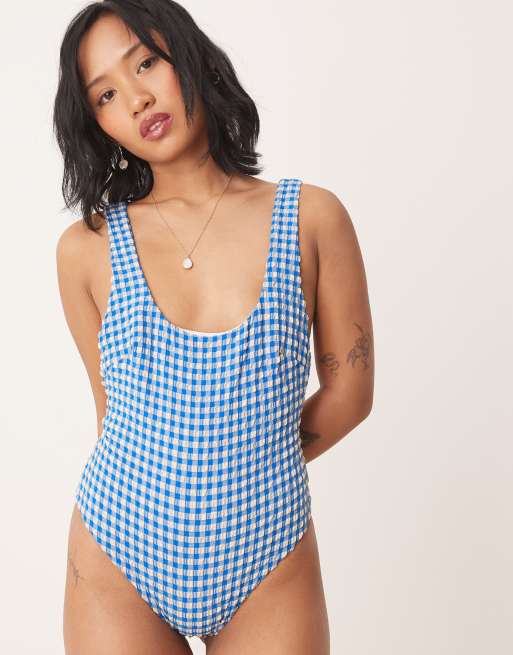ASOS DESIGN Petite seersucker scoop swimsuit with giant bow back detail in blue gingham