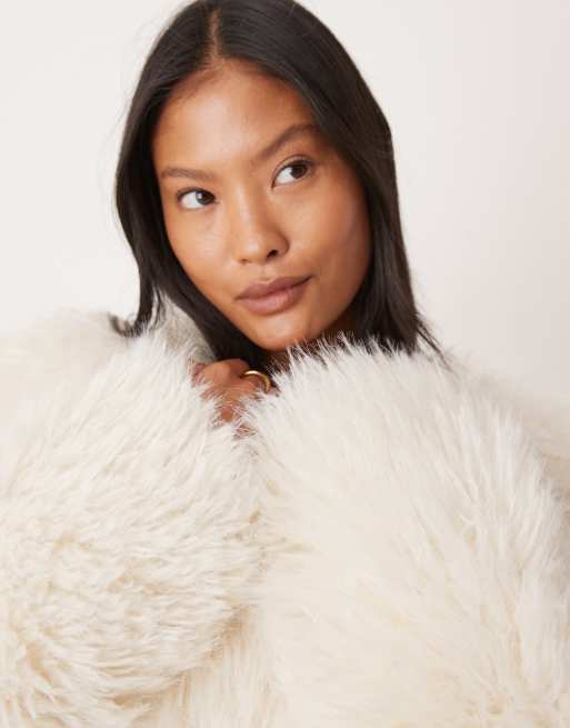 ASOS DESIGN Petite shaggy faux fur jacket in cream | ASOS
