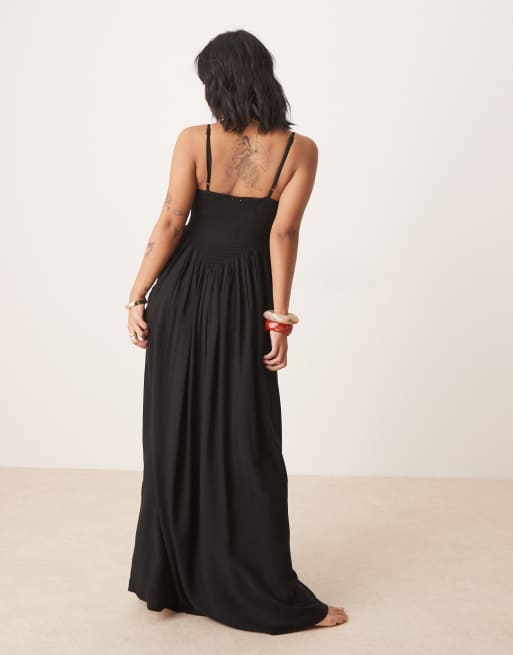 ASOS DESIGN Petite shirred maxi beach dress in black | ASOS