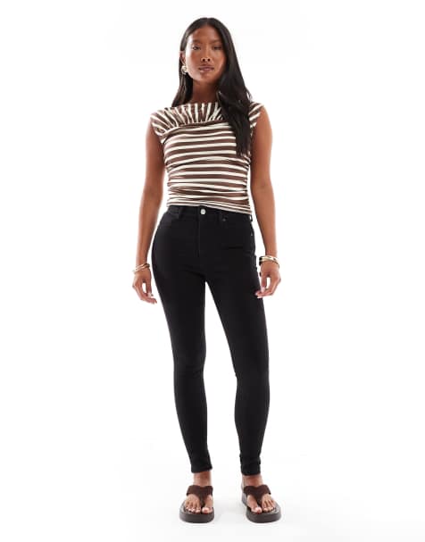 ASOS DESIGN Petite skinny jeans in clean black - view 1