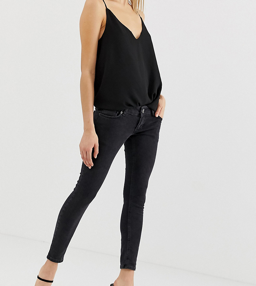 ASOS DESIGN - Petite - Skinny jeans met extreem lage taille in zwarte wassing
