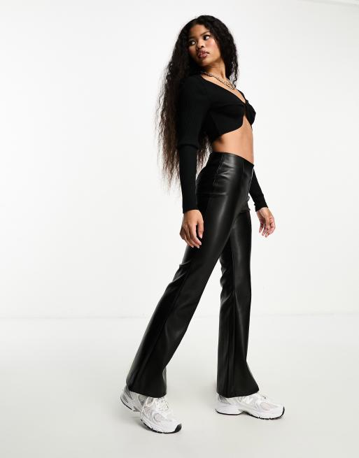 ASOS DESIGN Petite stretch faux leather flare pants in black