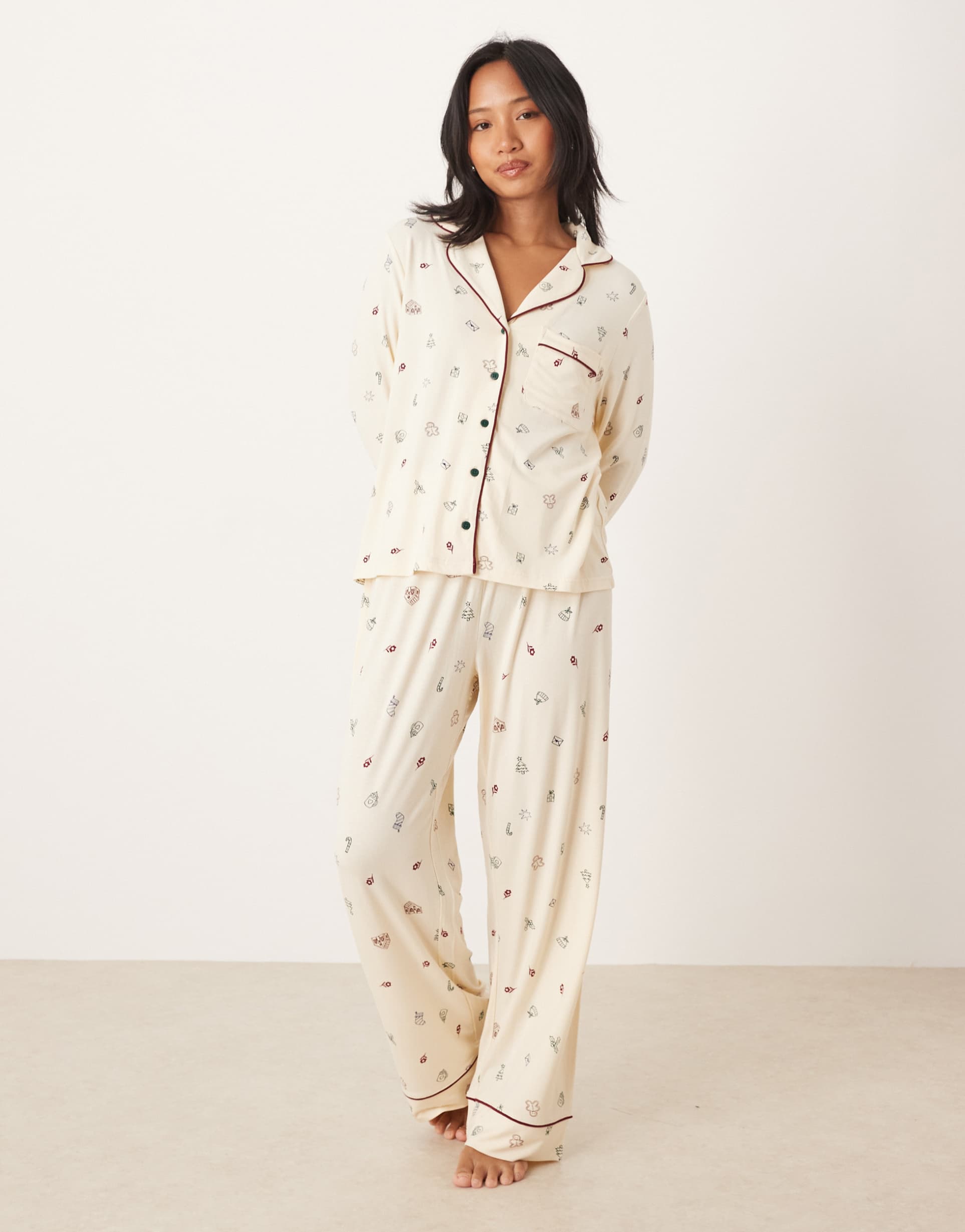 asos design petite super soft long sleeve shirt & pants pajama set with contrast piping in christmas icon print