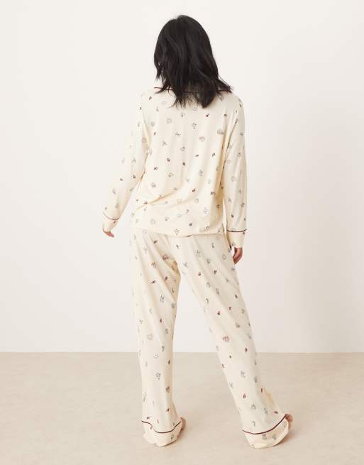 ASOS DESIGN Petite super soft long sleeve shirt & pants pajama set with contrast piping in Christmas icon print