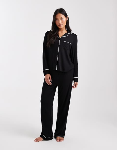 ASOS DESIGN Petite super soft long sleeve shirt & pants pyjama set with contrast piping in black - view 1