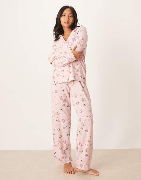 ASOS DESIGN Petite super soft long sleeve shirt & trouser pyjama set with contrast piping in ski print - view 1