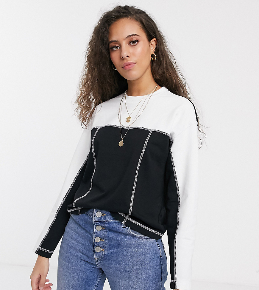 ASOS DESIGN Petite sweatshirt in color block with flat lock seams-Black