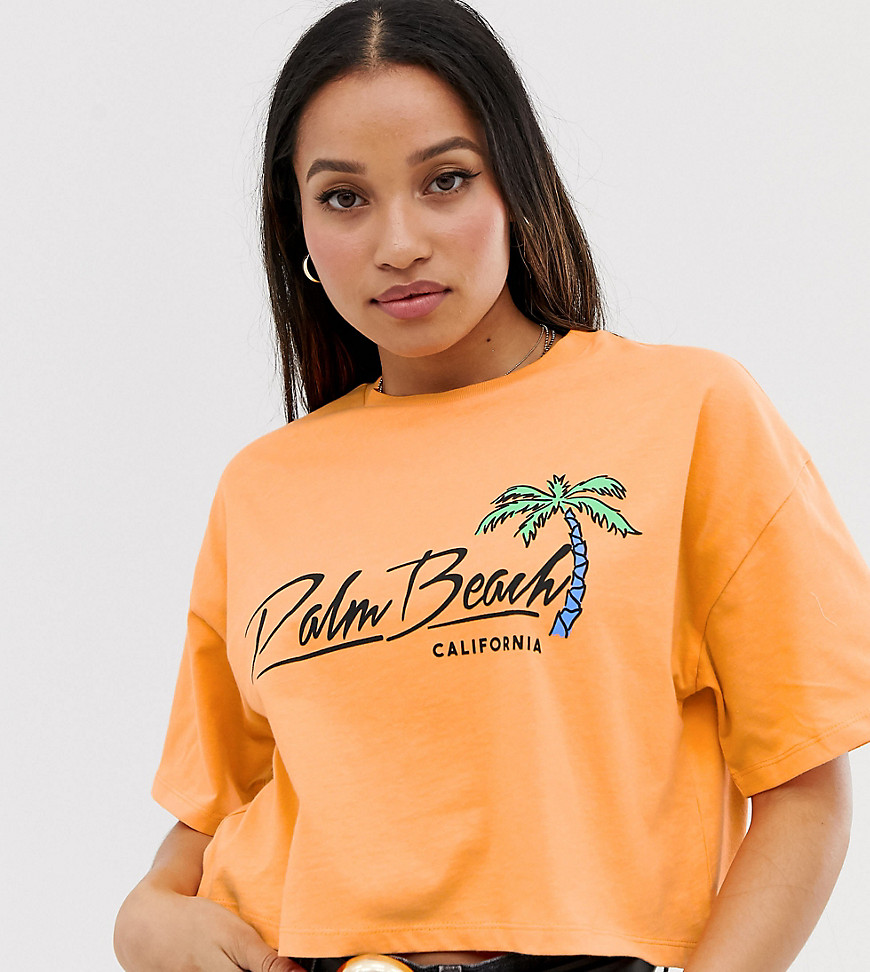 ASOS DESIGN Petite - T-shirt met wassing en palm beach-print-Oranje