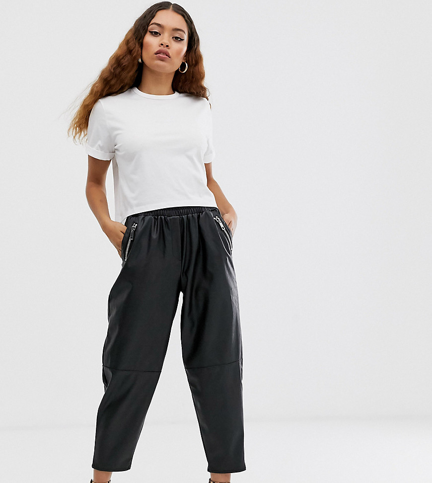 ASOS DESIGN Petite tapered leather look trousers-Black