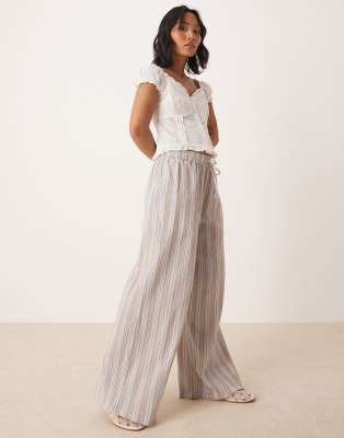 ASOS DESIGN Petite textured linen look wide leg pull on pants in multi stripe