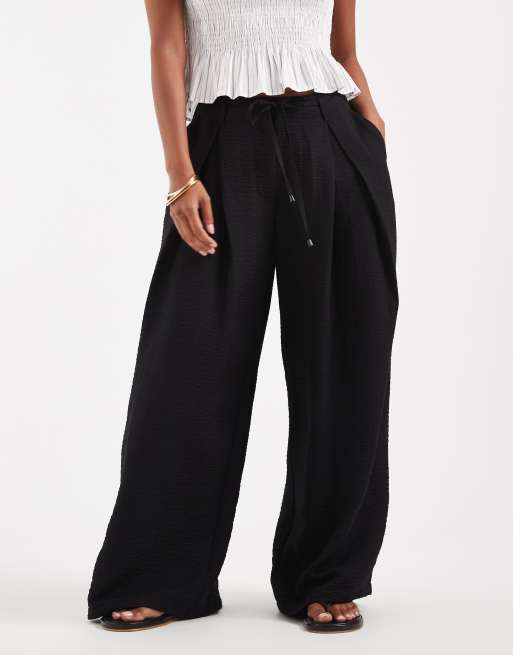 ASOS DESIGN Petite textured wide leg trousers with tie waist in black, 2 of 5