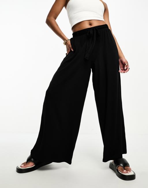 ASOS DESIGN Petite wide leg pants in black