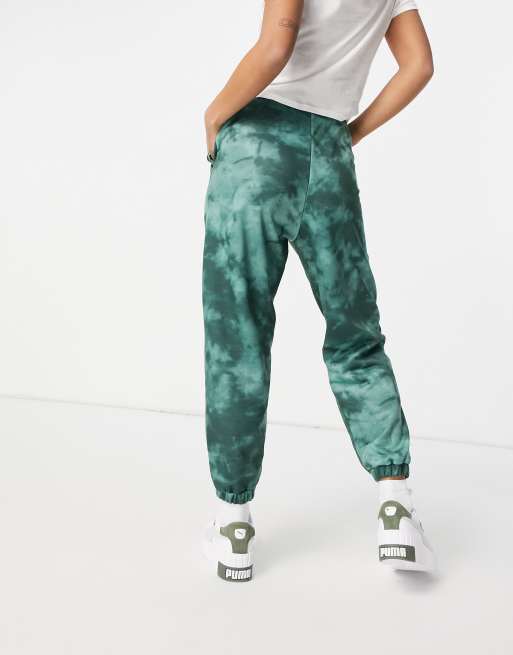 ASOS DESIGN Petite tie dye sweatpants in green