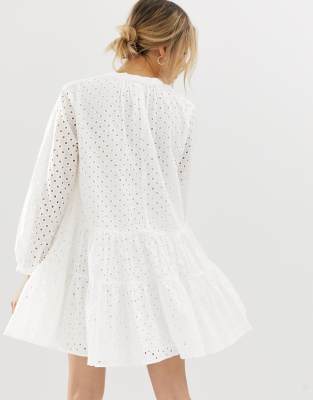 asos design petite tiered trapeze mini dress in broderie