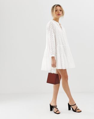 tiered trapeze mini dress in broderie