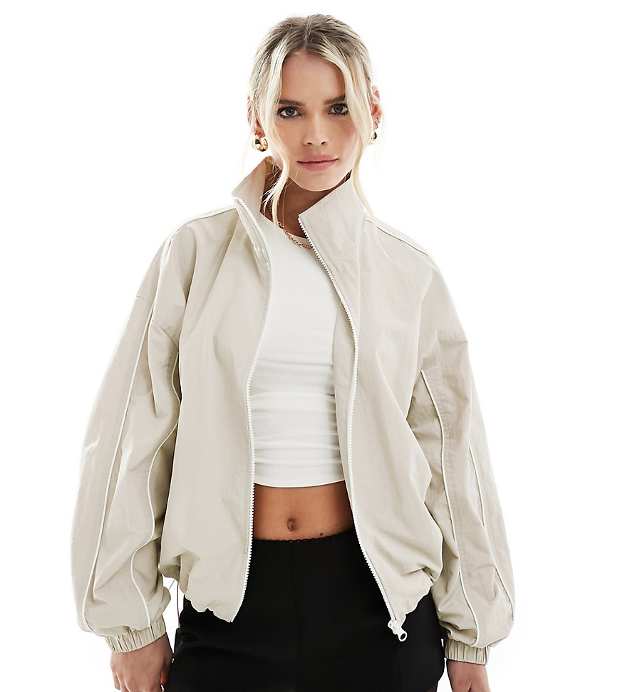 ASOS DESIGN Petite track jacket with piping detail in stone-Neutral