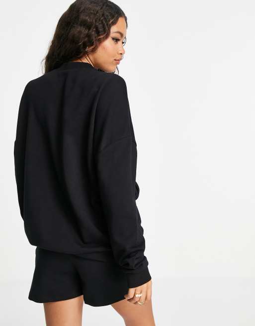 ASOS DESIGN Petite tracksuit oversized sweatshirt / ribbed legging short in  black