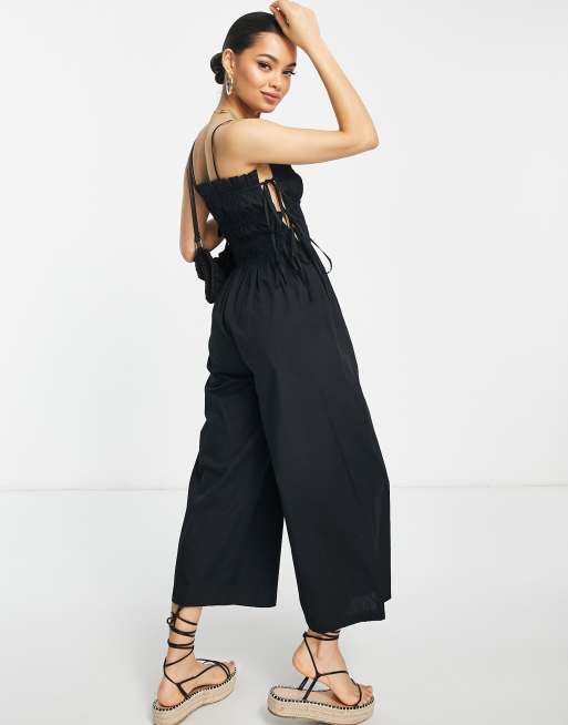 ASOS DESIGN Petite - Tuta jumpsuit arricciata con spalline sottili e laccetti laterali nera, 2 di 4