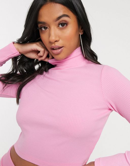 ASOS DESIGN long sleeve top with notch neck in rib in pink marl