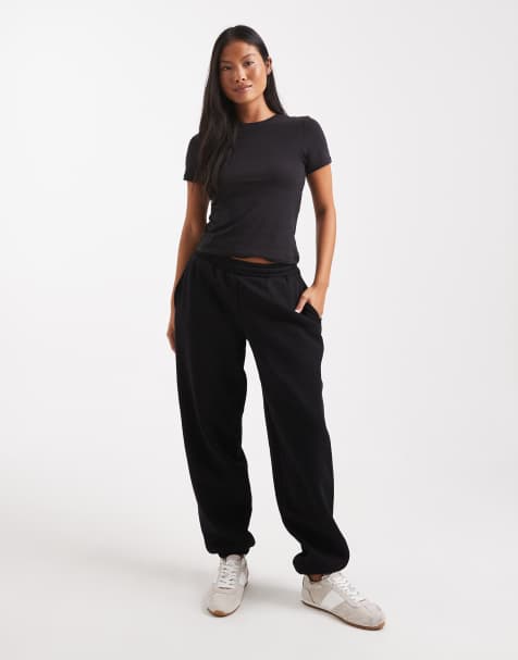 ASOS DESIGN Petite ultimate cuffed brushback trackies in black - view 1