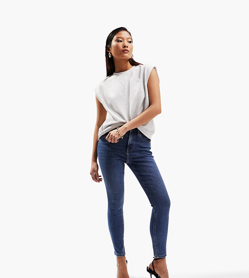 ASOS DESIGN Petite ultimate skinny jeans in authentic mid blue