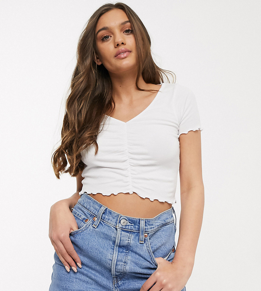 ASOS DESIGN Petite v front ruched detail top with lettuce edge detail in white