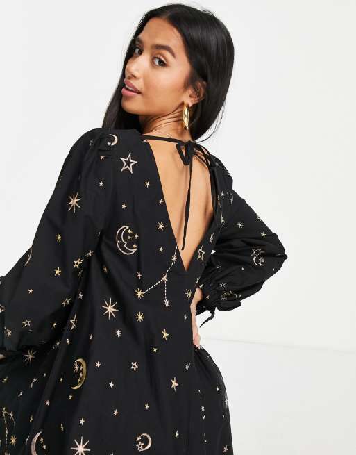 ASOS DESIGN Petite v front v back trapeze mini dress in star and moon  embroidery in black