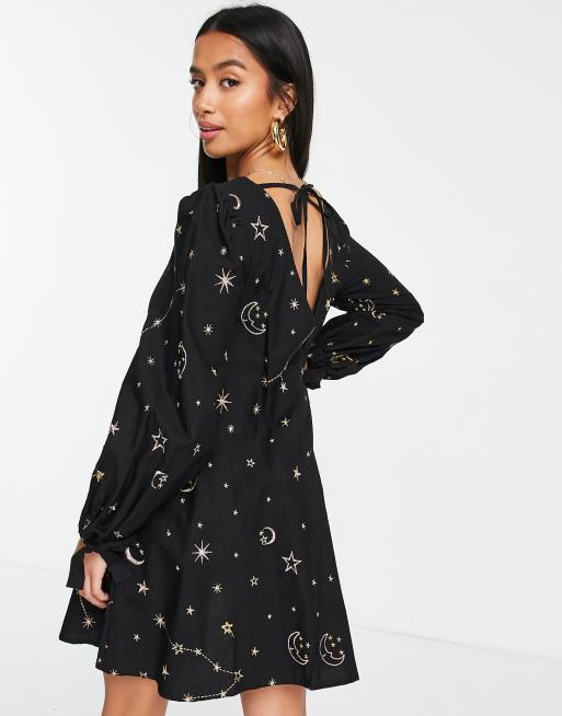 ASOS DESIGN Petite v front v back trapeze mini dress in star and moon  embroidery in black