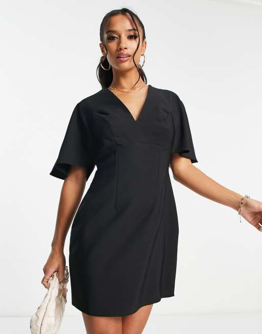 ASOS DESIGN Petite v neck mini dress with fluted sleeves in black