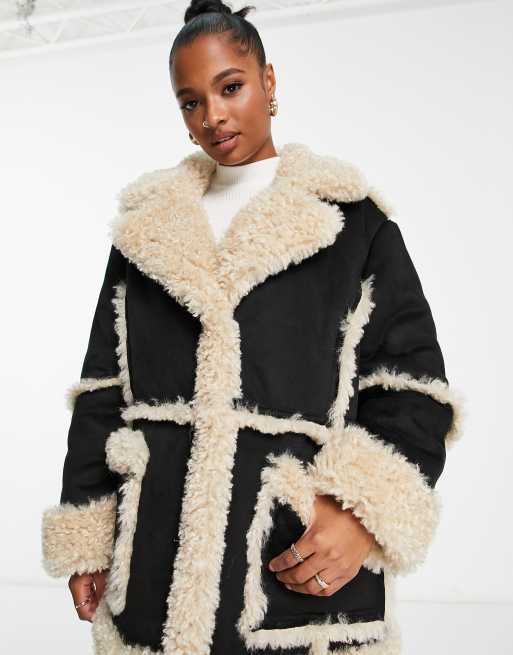 ASOS DESIGN Petite – Verstärkte Oversized-Pilotenjacke in Schwarz mit Teddyfell , 4 von 4