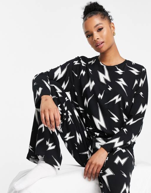 ASOS DESIGN Petite viscose lightning bolt long sleeve top & trouser pyjama set in black, 4 of 4