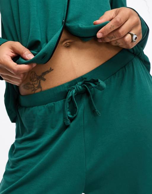 ASOS DESIGN satin shirt & pants pajama set with contrast piping in emerald  green