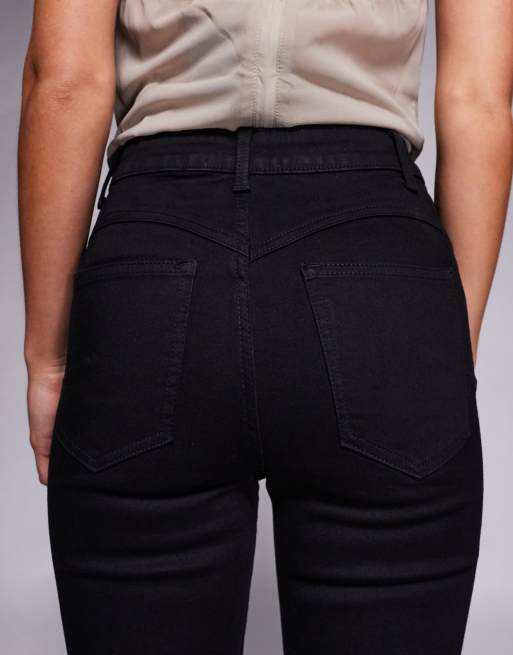 ASOS DESIGN Petite - Vormgevende flared jeans met power stretch in zwart, 4 van 5