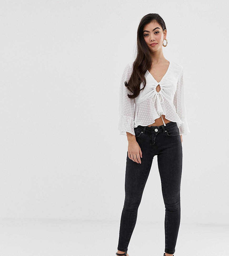 Asos Petite Asos Design Petite Whitby Low Rise Skinny Jeans In Washed Black With Western Fly Detail