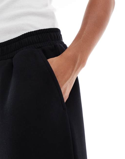 ASOS DESIGN Petite wide leg brushback sweatpants in black