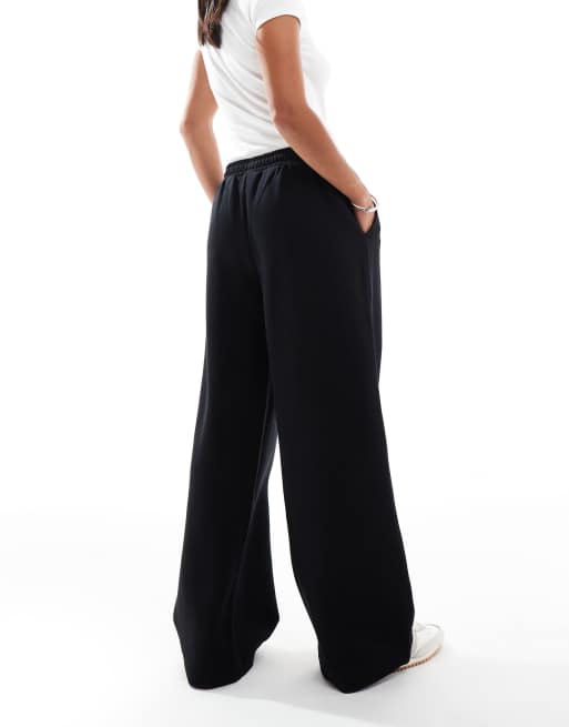 ASOS DESIGN Petite wide leg brushback sweatpants in black