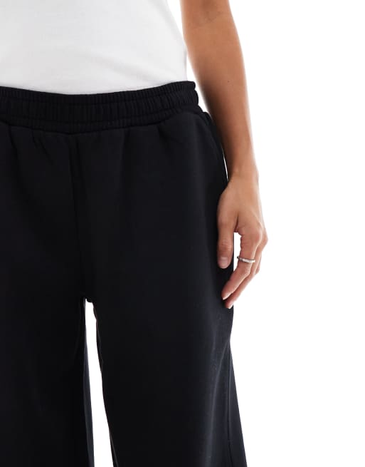 ASOS DESIGN Petite wide leg brushback sweatpants in black