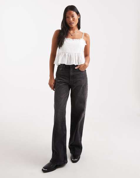 ASOS DESIGN Petite wide leg dad jeans in washed black
